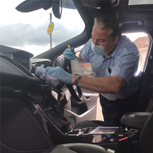 Vehicle Purchaser at appointment cleaning vehicle